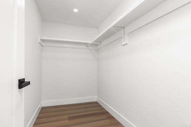 6802 Maury Dr, San Diego, CA 92119 - walk in closet with dark wood-style flooring
