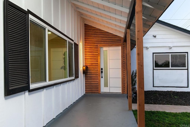 6802 Maury Dr, San Diego, CA 92119 - doorway to property with board and batten siding