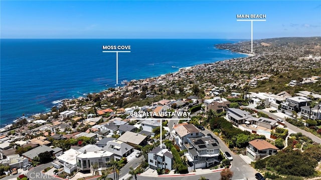 aerial perspective of suburban area featuring a nearby body of water
