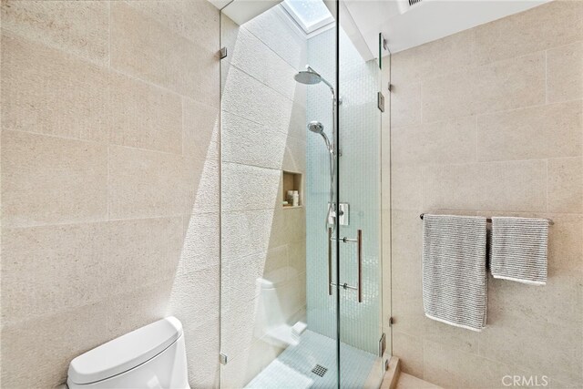 683 Alta Vista Way, Laguna Beach, CA 92651 - bathroom featuring tile walls and a shower stall