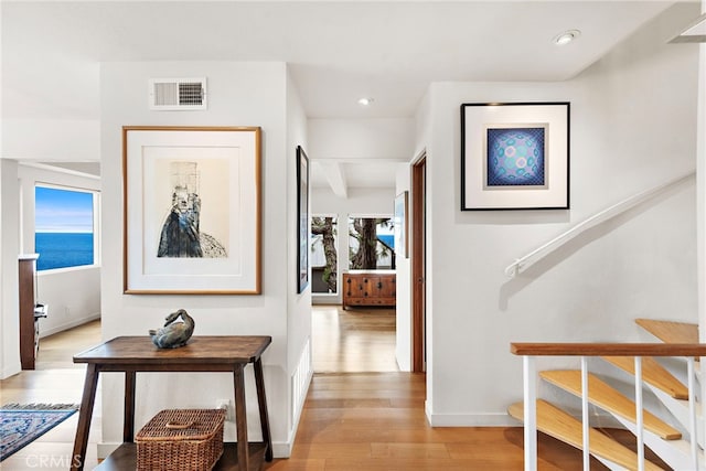 683 Alta Vista Way, Laguna Beach, CA 92651 - hall featuring wood finished floors, stairway, and recessed lighting