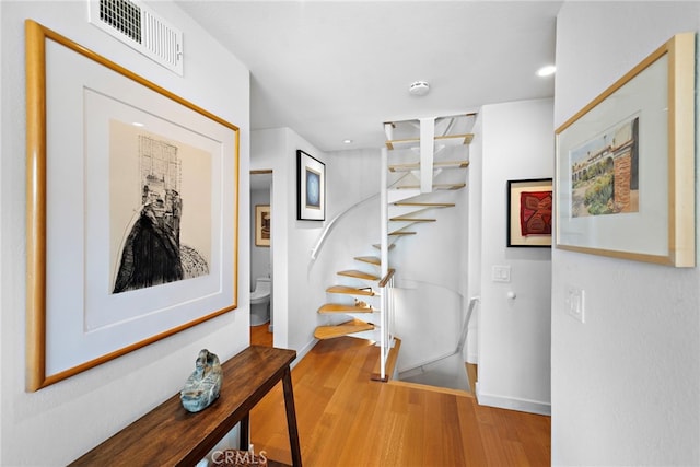 683 Alta Vista Way, Laguna Beach, CA 92651 - hallway featuring wood finished floors, recessed lighting, and stairway
