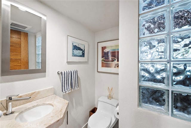 half bathroom with a sink and toilet