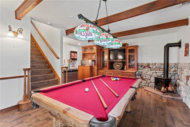 26061 Augusta Dr, Lake Arrowhead, CA 92391 - playroom featuring beamed ceiling, wood finished floors, billiards, a wood stove, and baseboards