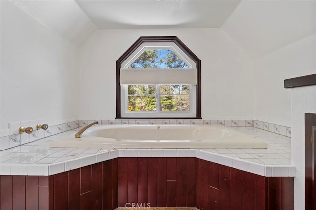 26061 Augusta Dr, Lake Arrowhead, CA 92391 - bathroom with vaulted ceiling and a bath