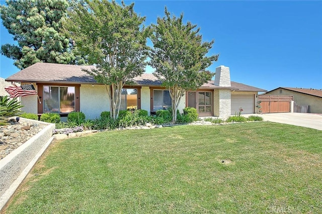 1244 N Albright Ave, Upland, CA 91786 - view of front of property with concrete driveway, a chimney, a front yard, a garage, and stucco siding