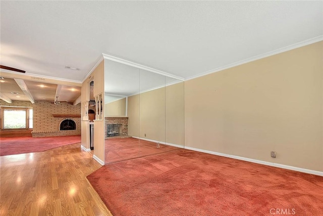 1244 N Albright Ave, Upland, CA 91786 - unfurnished living room with a fireplace, wood finished floors, crown molding, baseboards, and brick wall