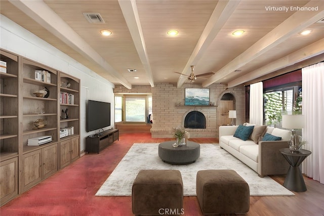 1244 N Albright Ave, Upland, CA 91786 - living room featuring a fireplace, ceiling fan, beamed ceiling, and dark wood-style flooring