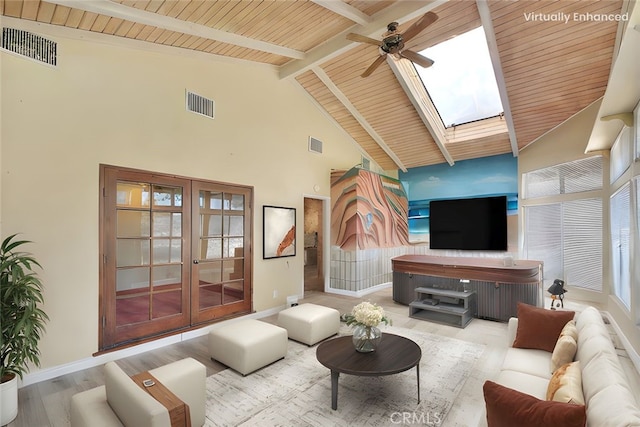 1244 N Albright Ave, Upland, CA 91786 - living room featuring a ceiling fan, a skylight, high vaulted ceiling, beam ceiling, and baseboards