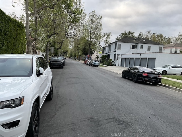 4183 4th Ave, Los Angeles, CA 90008 - view of asphalt road with a residential view and sidewalks