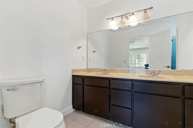 56620 Hidden Gold Dr, Yucca Valley, CA 92284 - full bath featuring toilet, tile patterned flooring, double vanity, and baseboards