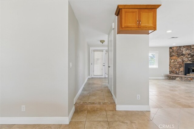 56620 Hidden Gold Dr, Yucca Valley, CA 92284 - hallway with light tile patterned flooring and baseboards