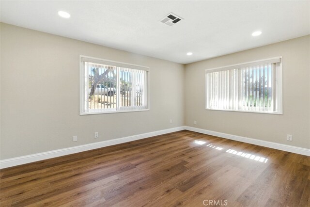 56620 Hidden Gold Dr, Yucca Valley, CA 92284 - unfurnished room featuring wood finished floors, baseboards, and recessed lighting