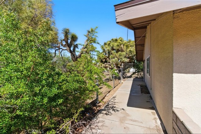 56620 Hidden Gold Dr, Yucca Valley, CA 92284 - view of side of property featuring stucco siding