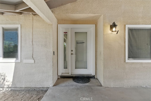 56620 Hidden Gold Dr, Yucca Valley, CA 92284 - property entrance with stucco siding