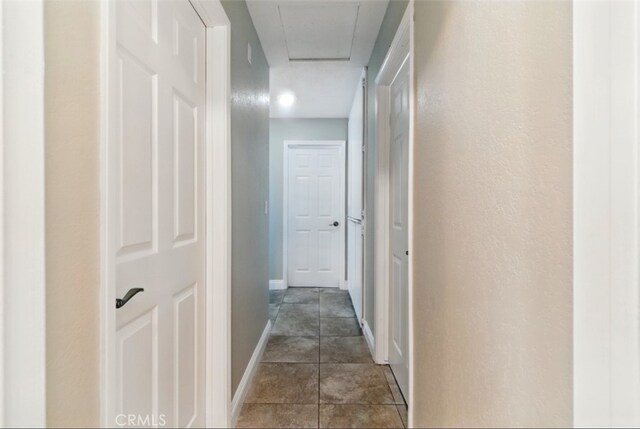 56620 Hidden Gold Dr, Yucca Valley, CA 92284 - hall featuring attic access and baseboards
