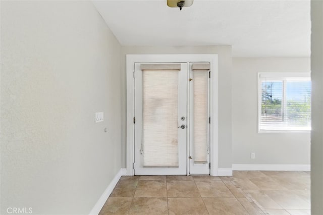 56620 Hidden Gold Dr, Yucca Valley, CA 92284 - entryway with baseboards and light tile patterned floors