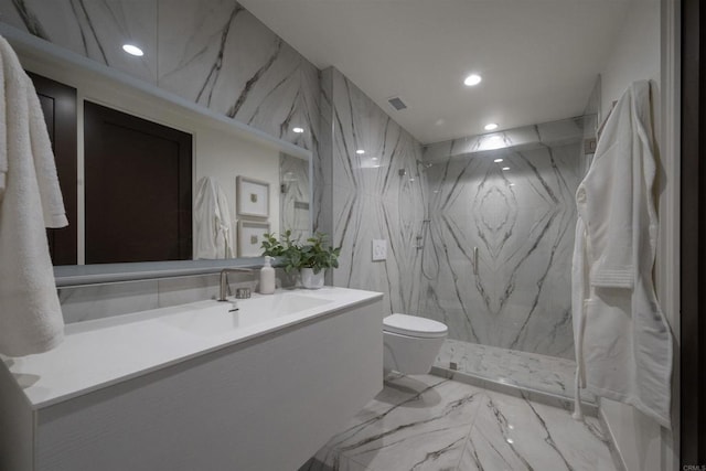 bathroom featuring toilet, marble tiled flooring, recessed lighting, vanity, and a marble finish shower