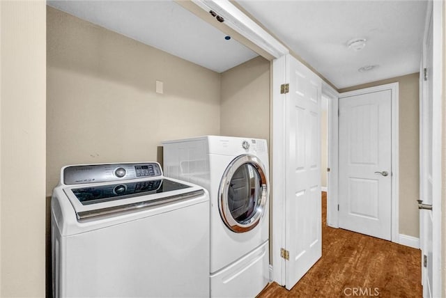 15605 Facilidad St, Hacienda Heights, CA 91745 - laundry area featuring washing machine and clothes dryer, wood finished floors, and baseboards