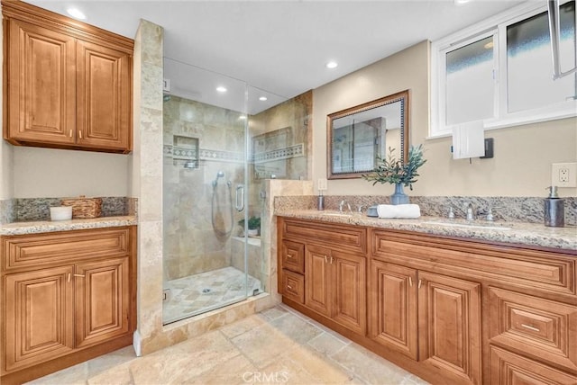 15605 Facilidad St, Hacienda Heights, CA 91745 - bathroom featuring vanity, recessed lighting, a shower stall, and stone finish flooring