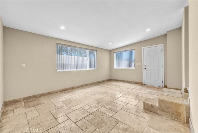 15605 Facilidad St, Hacienda Heights, CA 91745 - empty room featuring stone tile floors, baseboards, and recessed lighting