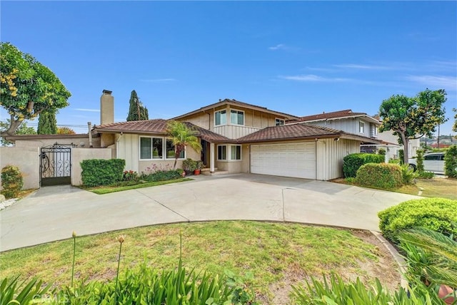 15605 Facilidad St, Hacienda Heights, CA 91745 - view of front of property featuring a chimney, a garage, and driveway