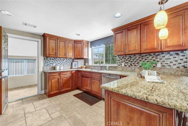 15605 Facilidad St, Hacienda Heights, CA 91745 - kitchen featuring brown cabinets, tasteful backsplash, stainless steel dishwasher, a sink, and light stone counters