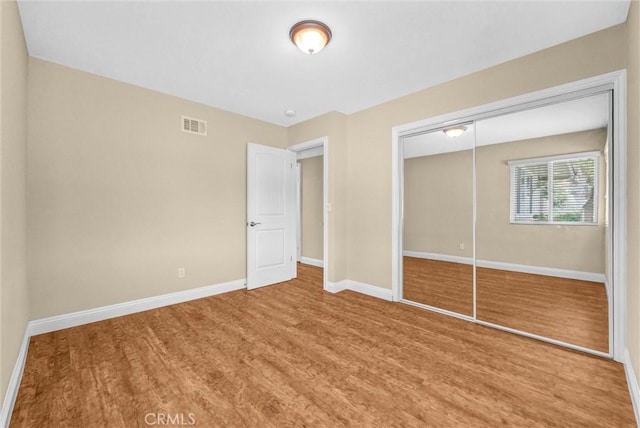 15605 Facilidad St, Hacienda Heights, CA 91745 - unfurnished bedroom featuring baseboards, wood finished floors, and a closet