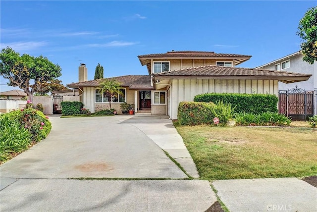 15605 Facilidad St, Hacienda Heights, CA 91745 - view of front of home with a chimney and a gate