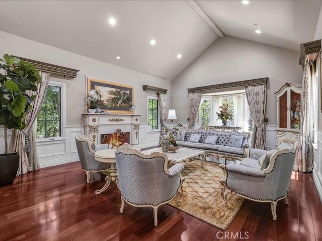 2560 Raleigh Dr, San Marino, CA 91108 - living area featuring a wainscoted wall, wood finished floors, a decorative wall, high vaulted ceiling, and recessed lighting