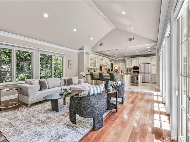 2560 Raleigh Dr, San Marino, CA 91108 - living area with light wood-style flooring, crown molding, high vaulted ceiling, beverage cooler, and recessed lighting