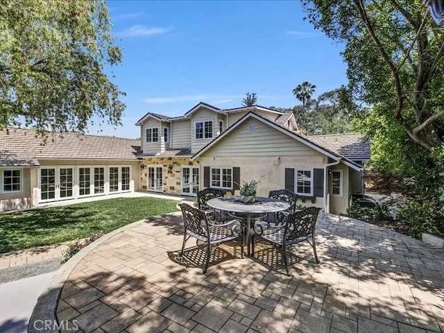 2560 Raleigh Dr, San Marino, CA 91108 - back of house with french doors, a patio, a lawn, and stucco siding