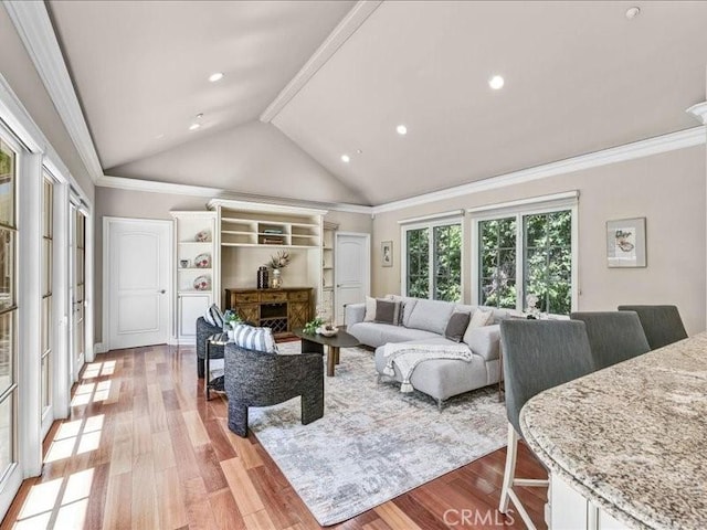 2560 Raleigh Dr, San Marino, CA 91108 - living area with light wood-type flooring, vaulted ceiling, crown molding, and recessed lighting