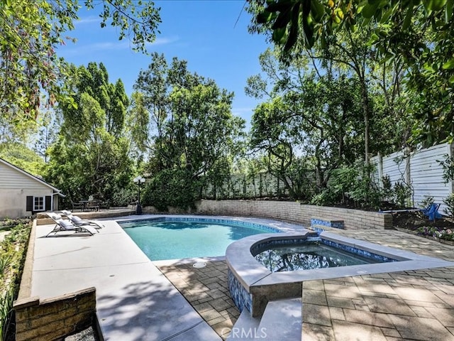 2560 Raleigh Dr, San Marino, CA 91108 - view of pool featuring a patio area, an in-ground hot tub, and view of wooded area