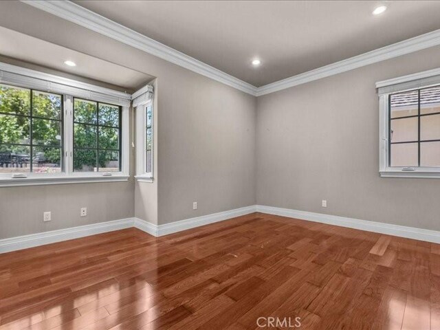 2560 Raleigh Dr, San Marino, CA 91108 - empty room featuring wood finished floors, baseboards, ornamental molding, and recessed lighting