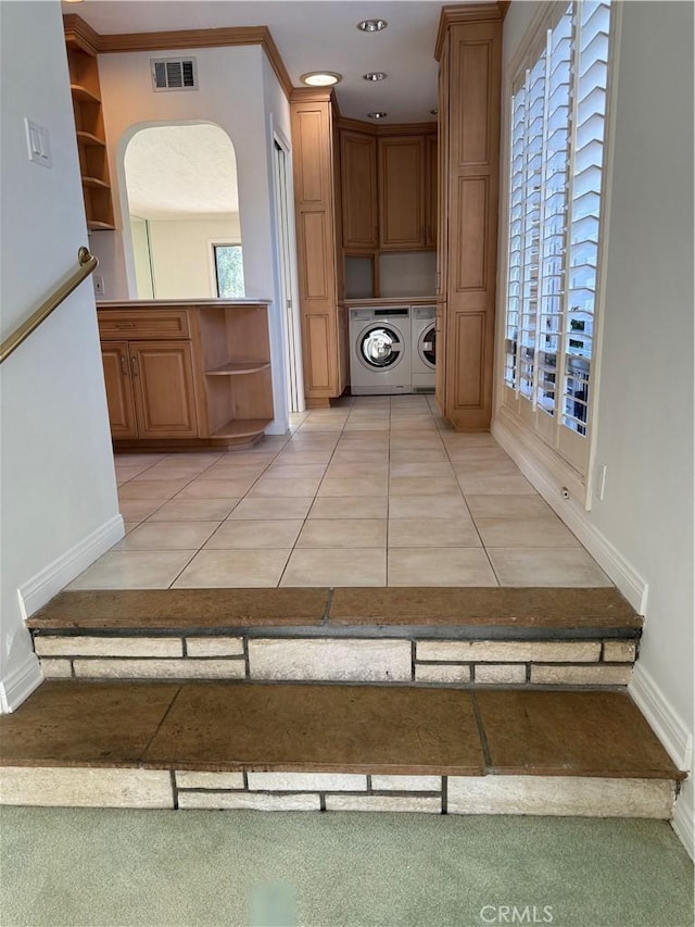 4333 N Country Club Ln, Long Beach, CA 90807 - corridor with separate washer and dryer, arched walkways, plenty of natural light, and baseboards