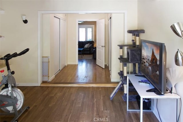 7391 Margerum Ave, San Diego, CA 92120 - exercise area with wood finished floors and baseboards