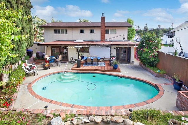 7391 Margerum Ave, San Diego, CA 92120 - swimming pool featuring outdoor dining area, a patio, and a wooden deck