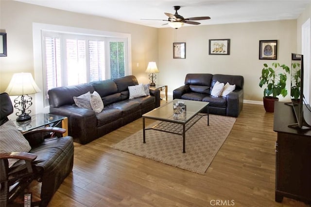 7391 Margerum Ave, San Diego, CA 92120 - living area with ceiling fan, wood finished floors, and baseboards