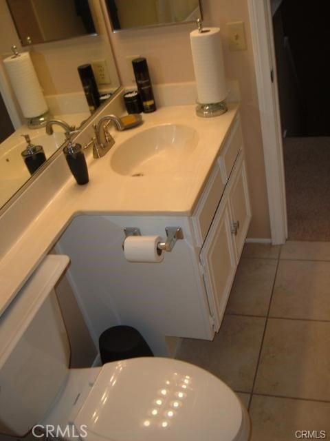 2452 Chandler Ave Unit 1, Simi Valley, CA 93065 - bathroom with tile patterned flooring, vanity, and toilet