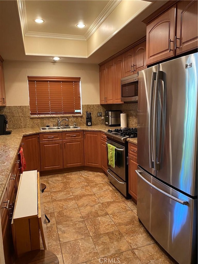 14919 Dickens St Unit 105, Sherman Oaks, CA 91403 - kitchen featuring stainless steel appliances, a sink, crown molding, decorative backsplash, and a raised ceiling