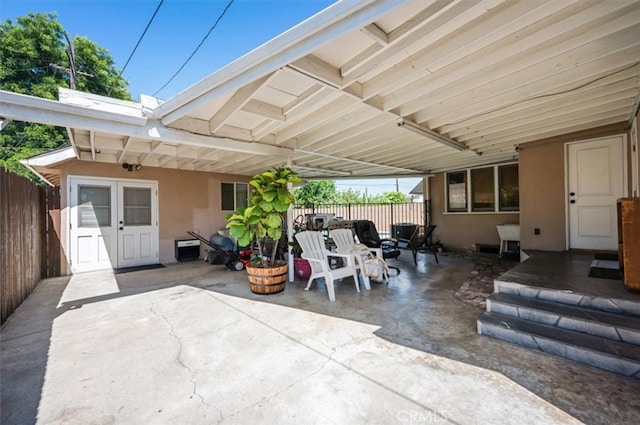 view of patio / terrace featuring fence