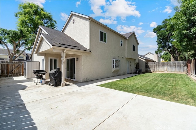 back of house featuring stucco siding, a patio area, a gate, and roof with shingles