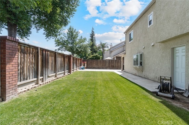 view of yard with a patio area