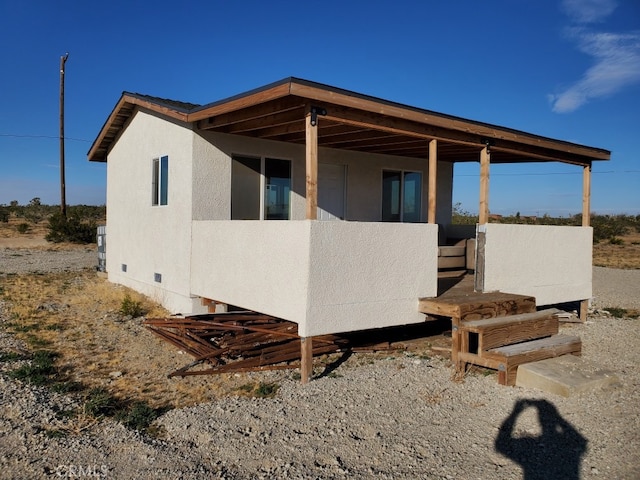 45849 185th St E, Lancaster, CA 93535 - view of side of home featuring crawl space and stucco siding
