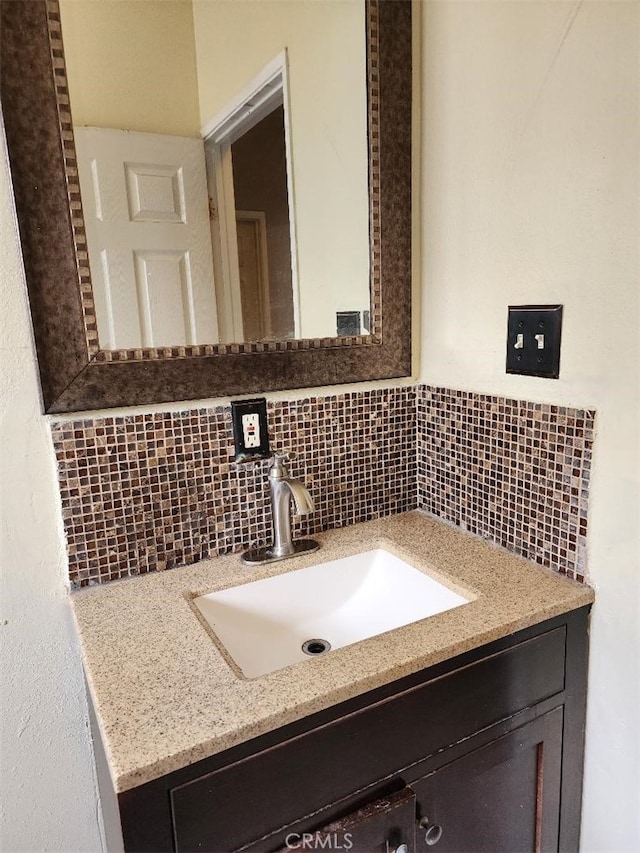 1009 Walnut St, Inglewood, CA 90301 - bathroom featuring vanity and tasteful backsplash
