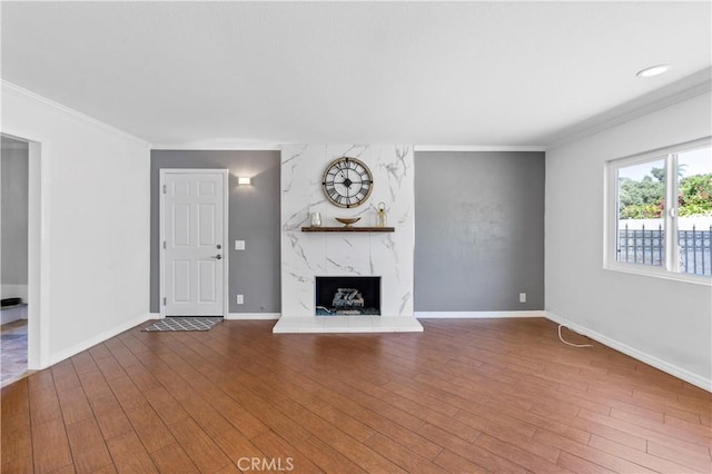 1879 N Nordic Pl, Orange, CA 92865 - unfurnished living room with crown molding, wood finished floors, a fireplace, and baseboards
