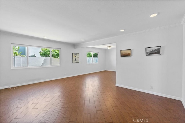 1879 N Nordic Pl, Orange, CA 92865 - unfurnished room featuring crown molding, dark wood finished floors, baseboards, and recessed lighting