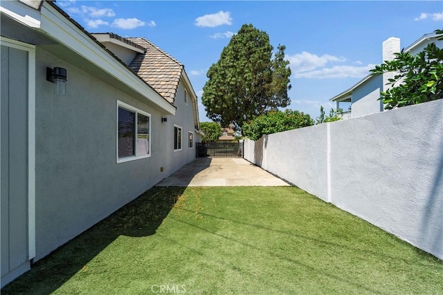 1879 N Nordic Pl, Orange, CA 92865 - view of yard featuring a patio