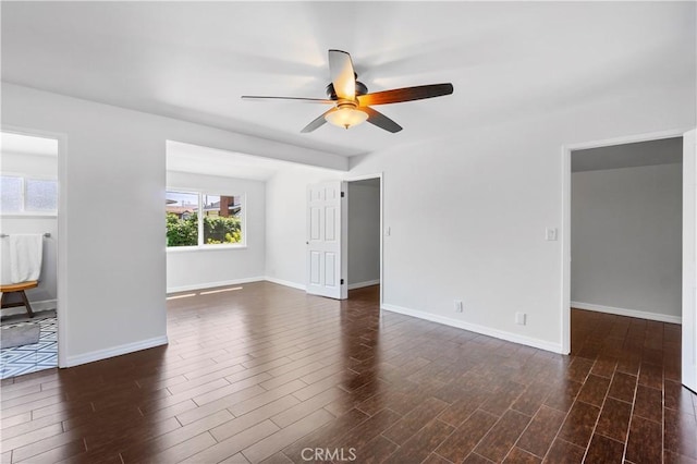 1879 N Nordic Pl, Orange, CA 92865 - spare room with ceiling fan, dark wood-type flooring, and baseboards